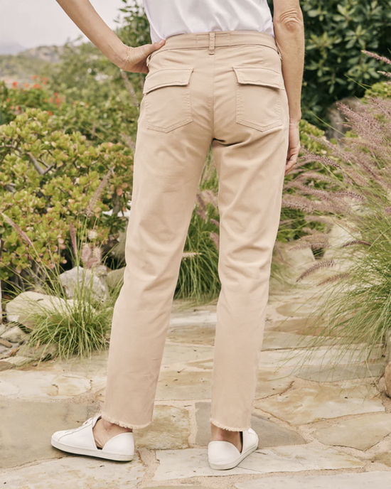 Person standing outdoors wearing Frank & Eileen Blackrock Utility Pant in Khaki and white slip-on shoes.