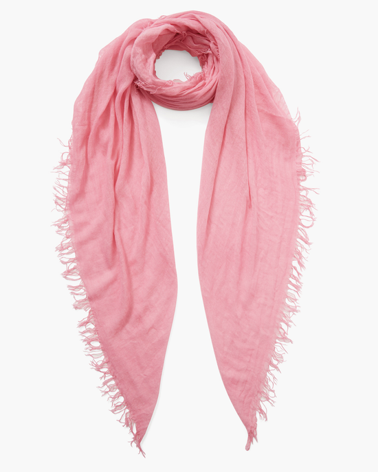 Chan Luu Cashmere & Silk Scarf in Sachet Pink with frayed edges isolated on a white background.