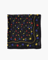 Folded black Spring Floral Bandana in Black fabric with a colorful floral pattern on a white background by Chan Luu.