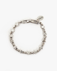 Clare V.'s Star Strand Bracelet in Sterling Silver features star-shaped links on a white background.
