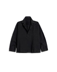 The Gabi Popover Shirt in Black Linen by Frank & Eileen features long sleeves, a loose fit, a collar, and a short buttonless placket, crafted from washed linen and shown laid flat on a white background.