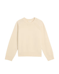 The Demylee Briella Merino Wool Sweater in Off White is a cream-colored, long-sleeve ribbed knit pullover with a crew neckline and ribbed cuffs, hem, and collar, shown laid flat on a white background.