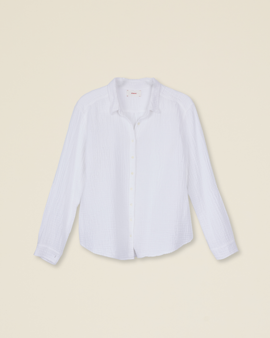 XiRENA Scout Blouse in White displayed on a pale yellow background.