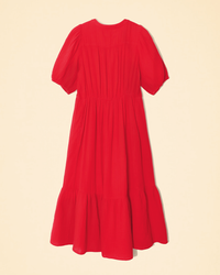 Real Red short-sleeved XiRENA Lennox Dress with a ruffled hem displayed on a pale background.