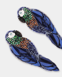Pair of Ara Earrings in Navy by Olivia Dar parrot-shaped earrings with blue, green, and bronze micro beadwork on a white background with a gold plated brass post.