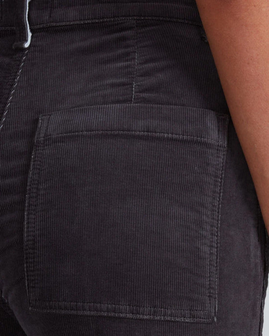 Close-up of the back pocket on ASKK NY’s Virginia Corduroy in Charcoal, highlighting the high-rise waistband and the signature vertical ribbed corduroy texture.