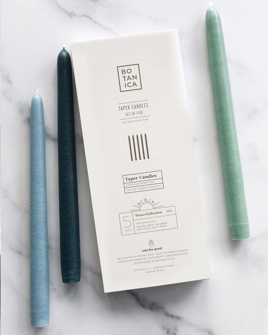 BOTANICA Zodiac Taper Candles in Water 