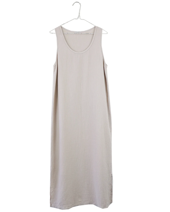 100% Organic Cotton Tank Dress in Sand Beige on a hanger against a white background by It is well LA.