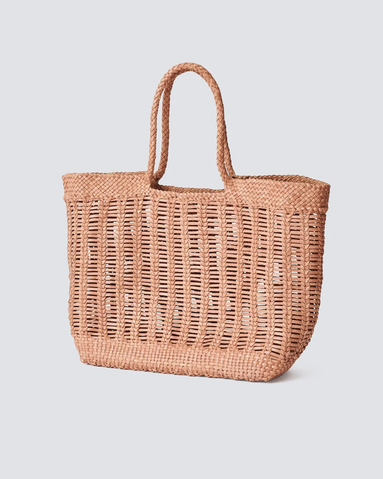 Hand-woven Dragon Diffusion Window Basket in Natural tote bag on a white background.