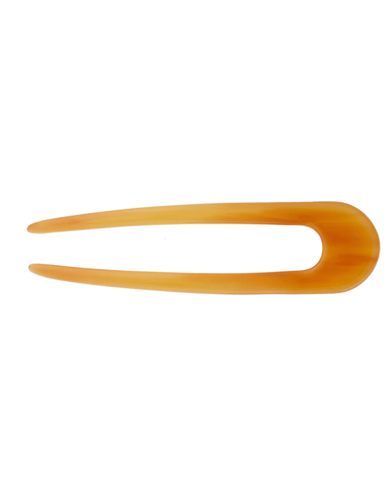 French Machete hairpin in Cognac acetate on a white background.