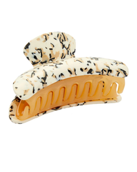 Hair clip with a speckled Terrazzo pattern and teeth for gripping hair, isolated on a white background: Grande Heirloom Claw in Terrazzo by Machete.