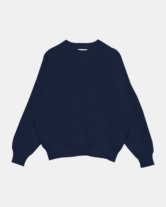 Navy blue Demylee Konan pullover crewneck sweater made from 100% organic cotton isolated on a white background.