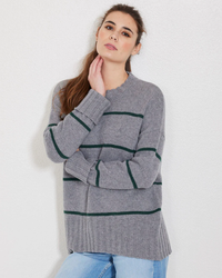 Woman in a Not Monday Mila Crewneck in Storm Grey & Jade Stripe cashmere sweater posing against a white background.