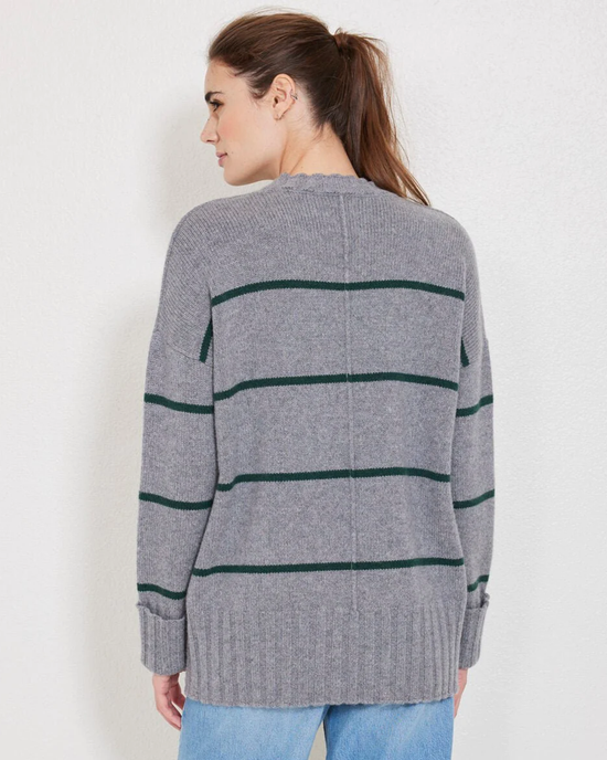 A woman seen from behind wearing a Not Monday Mila Crewneck in Storm Grey & Jade Stripe.