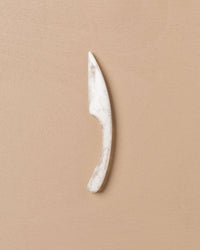 Saarde Home Flow Cheese Knife in Peach Blush