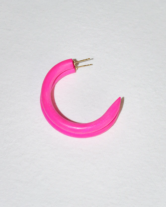 A vibrant pink B&L C Hoop in Small earring made of mango wood on a white background, sustainably sourced.