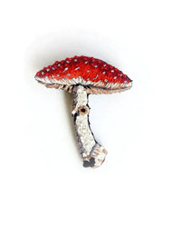 The Trovelore Fly Amanita Mushroom Brooch Pin features an embroidered red and white mushroom with a textured stem and white-dotted cap, inspired by handmade accessories, shown against a plain white background.