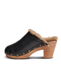 Woodpecker Mas Shearling clog in Black/Bronze by beek., isolated on a white background.