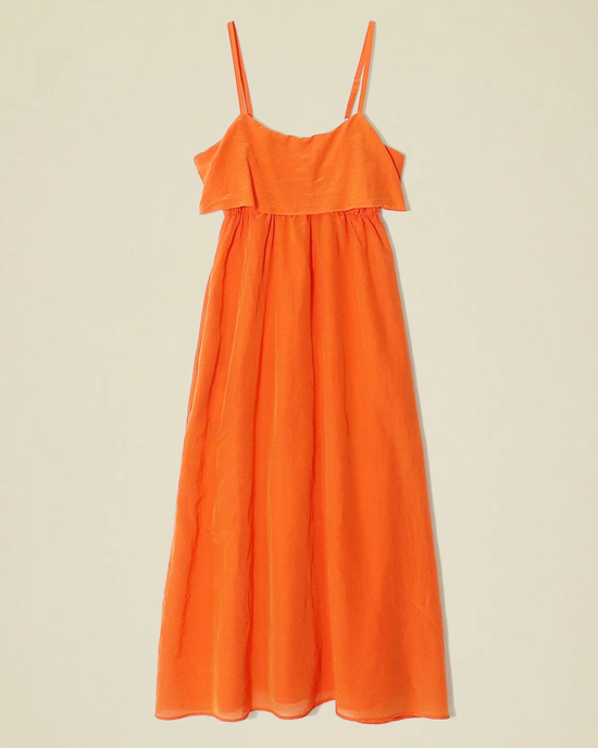 XiRENA's Skyla Dress in Papaya, a sleeveless Midi summer dress with a ruffled neckline, crafted from Cotton Silk Voile.
