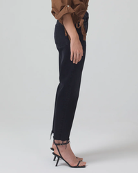 Woman wearing Daphne Crop 26.5" Inseam in Peppercorn Jeans by Citizens of Humanity and black heeled sandals.