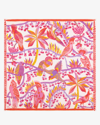 An Inoui Editions Square 130 Cerise in Pink scarf featuring a tropical bird and plant print design on a pink background, crafted from 100% Cotton.