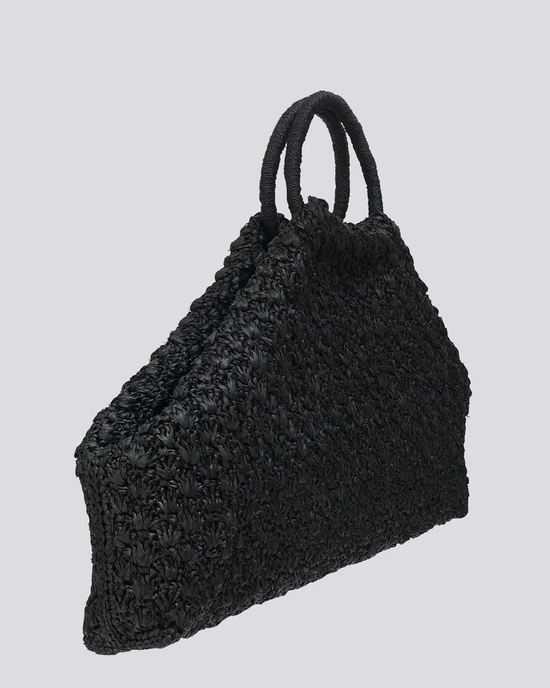 Clementine Bag in Black by Maison N.H Paris on a grey background.