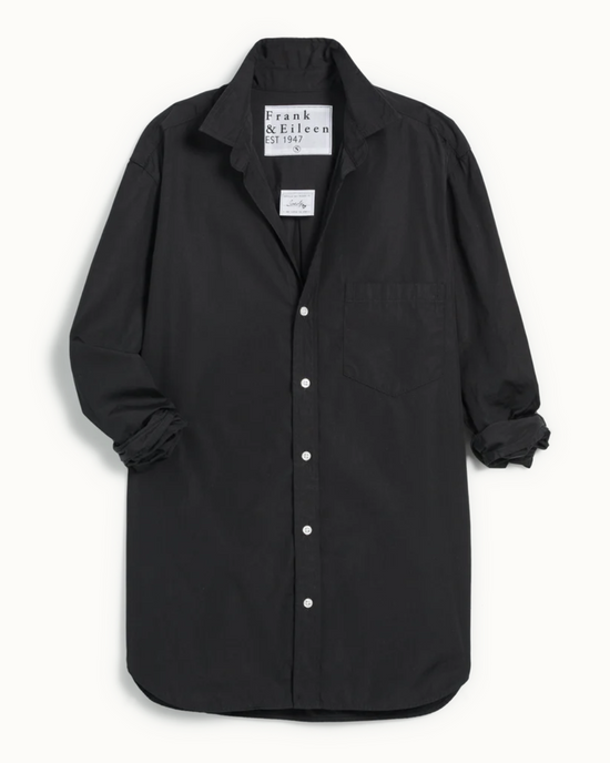 Black button-up Joedy in Black Superluxe Blouse with a tag displaying the Frank & Eileen brand and price displayed on a white background.