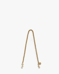 Thick Chain Shoulder Strap in Italian Brass by Clare V. isolated on a white background.