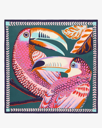 Colorful illustration of stylized birds on a Inoui Editions Square 65 Toucan in Emerald silk scarf.